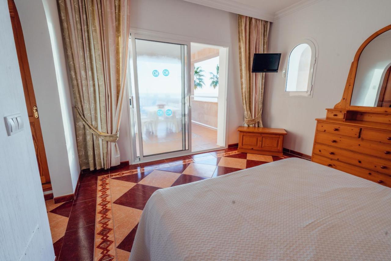 Apartamentos Punta Prima Beach Eksteriør bilde